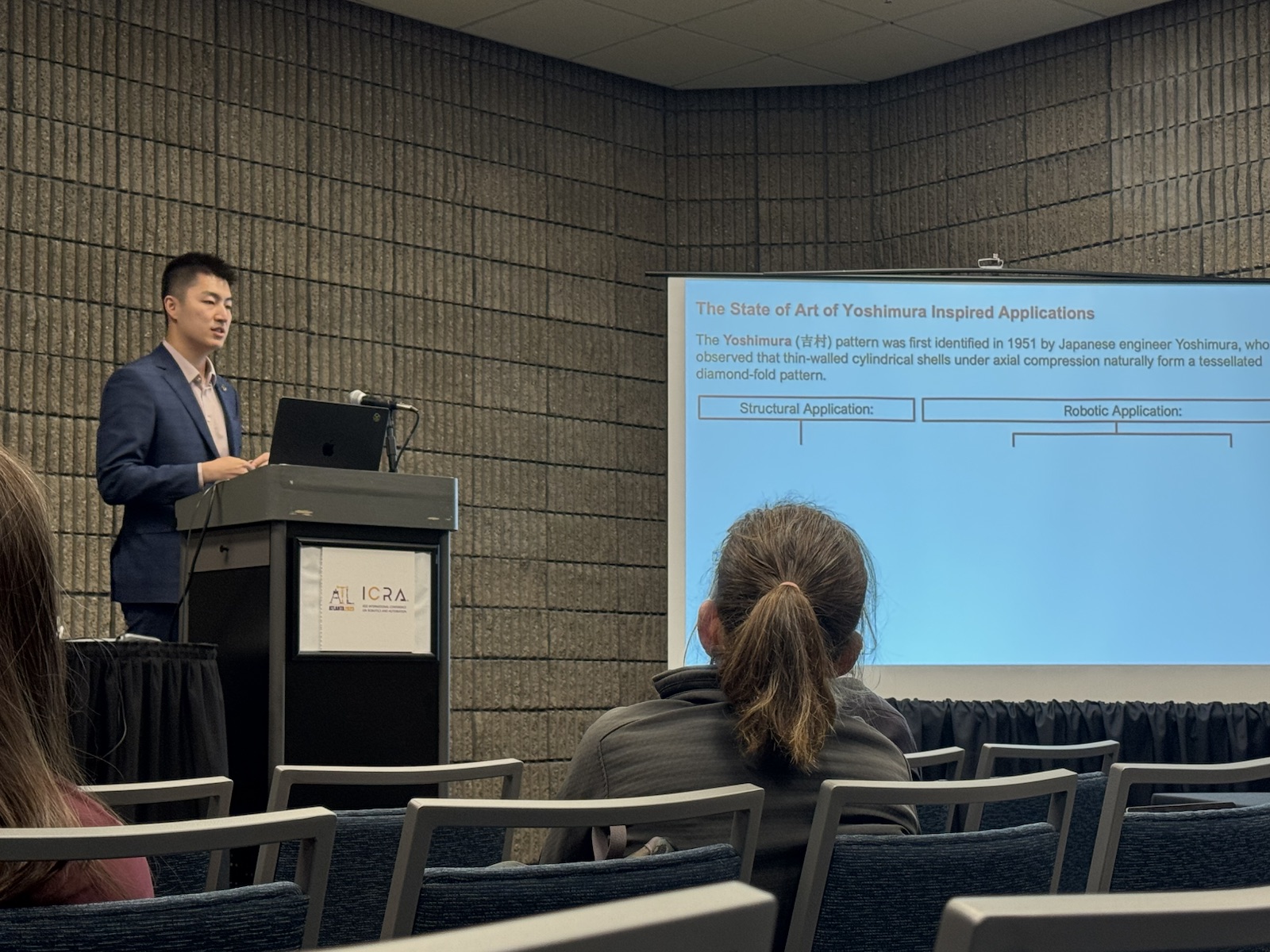 Ziyang Zhou presenting Hyper-Yoshimura research at ICRA 2025